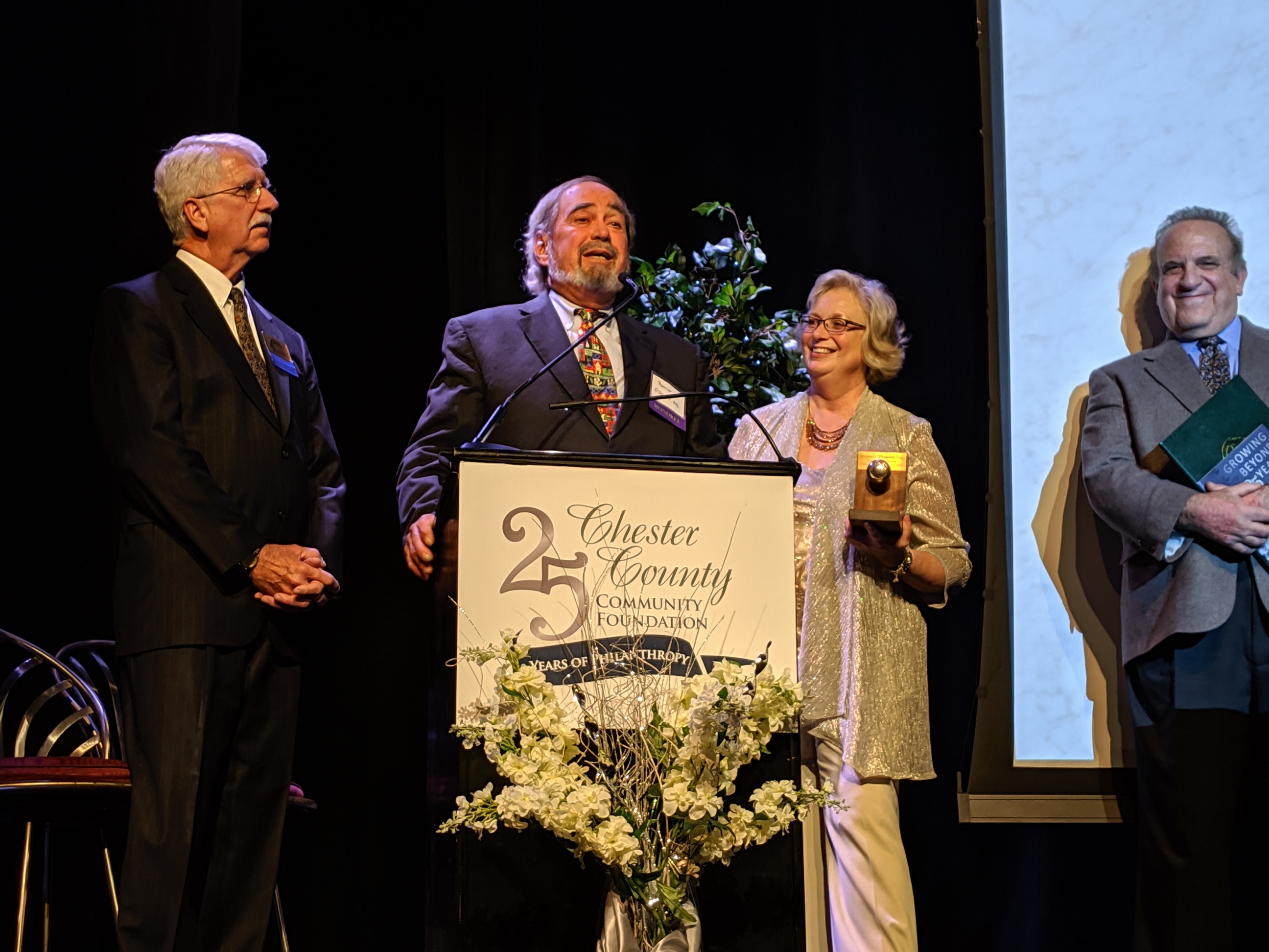 Patrick O'Donnell receives Legacy Philanthropy award at podium
