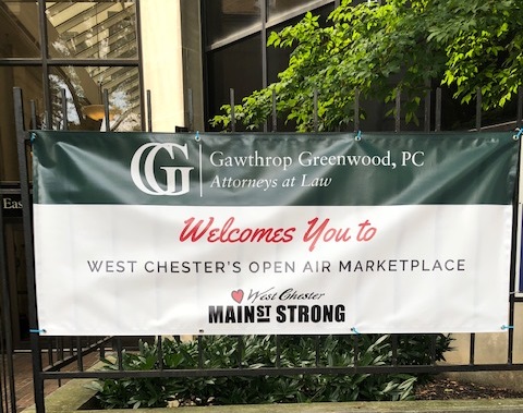 Sign in front of Gawthrop Greenwood's law offices in West Chester welcoming visitors to West Chester's Open Air Marketplace