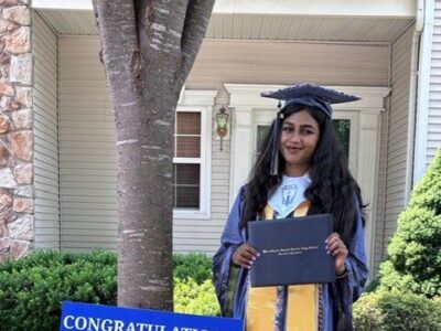 Gawthrop Greenwood law price recipient Diya Lakshmanan in her front yard on graduation day