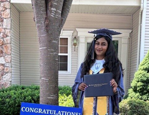 Gawthrop Greenwood law price recipient Diya Lakshmanan in her front yard on graduation day