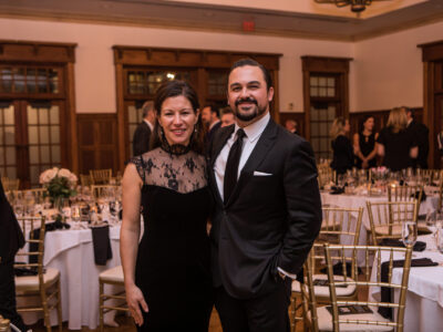 Gawthrop attorney James Doyle and his wife standing in front of tables at the CCBA President's Dinner
