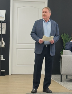 Attorney Steve Sugarman speaks to realtors in an office setting